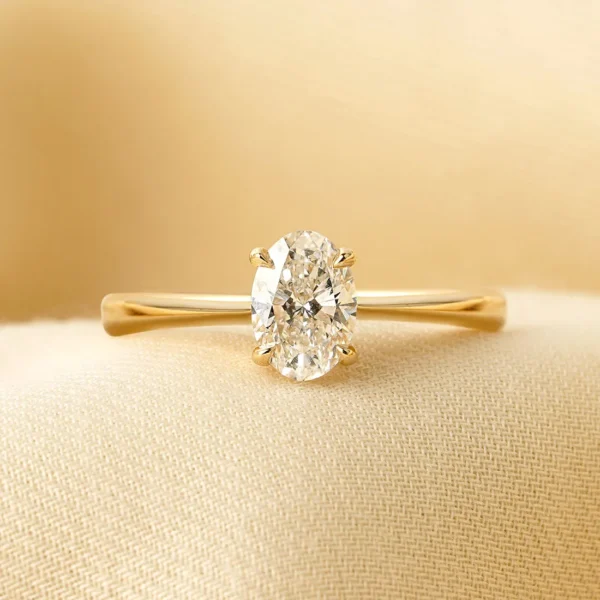0.70 Carat Oval-Cut Diamond Solitaire Ring (4) 0.70 Carat Oval-Cut Diamond Solitaire Ring (4)